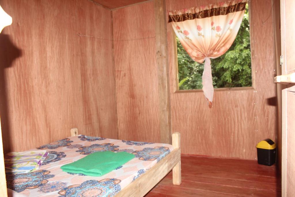 Postel nebo postele na pokoji v ubytování Batad Transient House