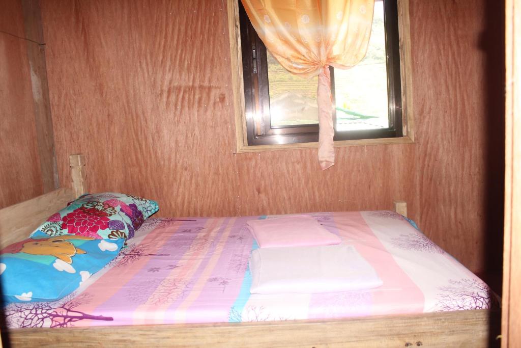 Postel nebo postele na pokoji v ubytování Batad Transient House