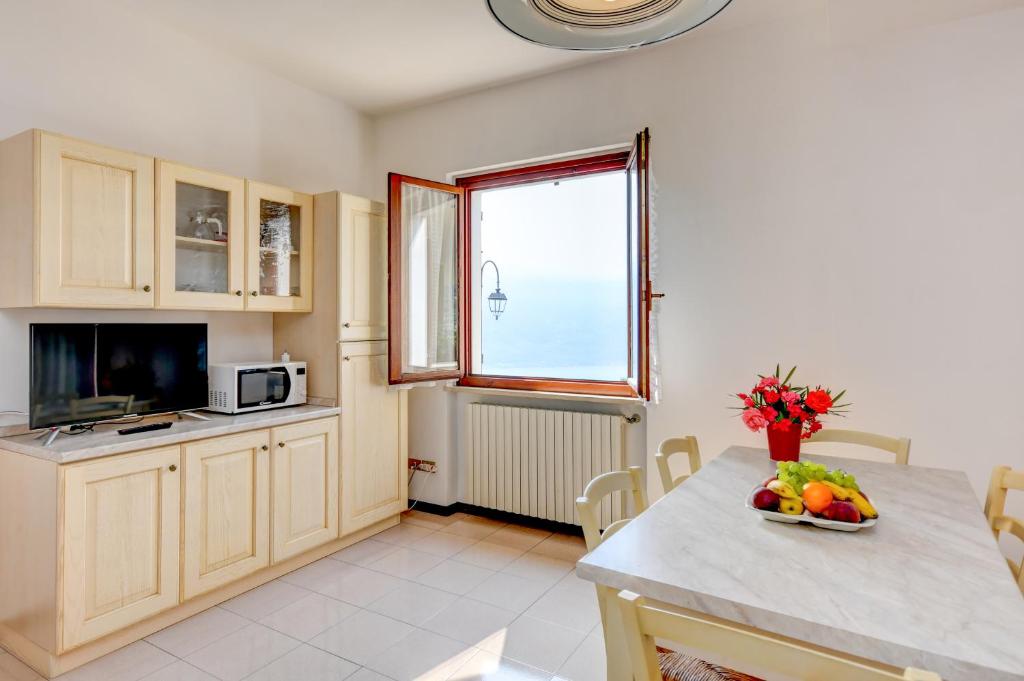 Kuchyň nebo kuchyňský kout v ubytování Residence Calap
