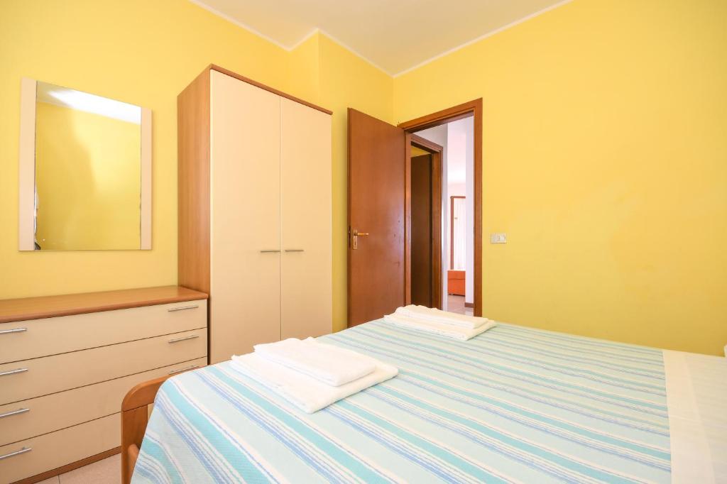Postel nebo postele na pokoji v ubytování Residence Calap