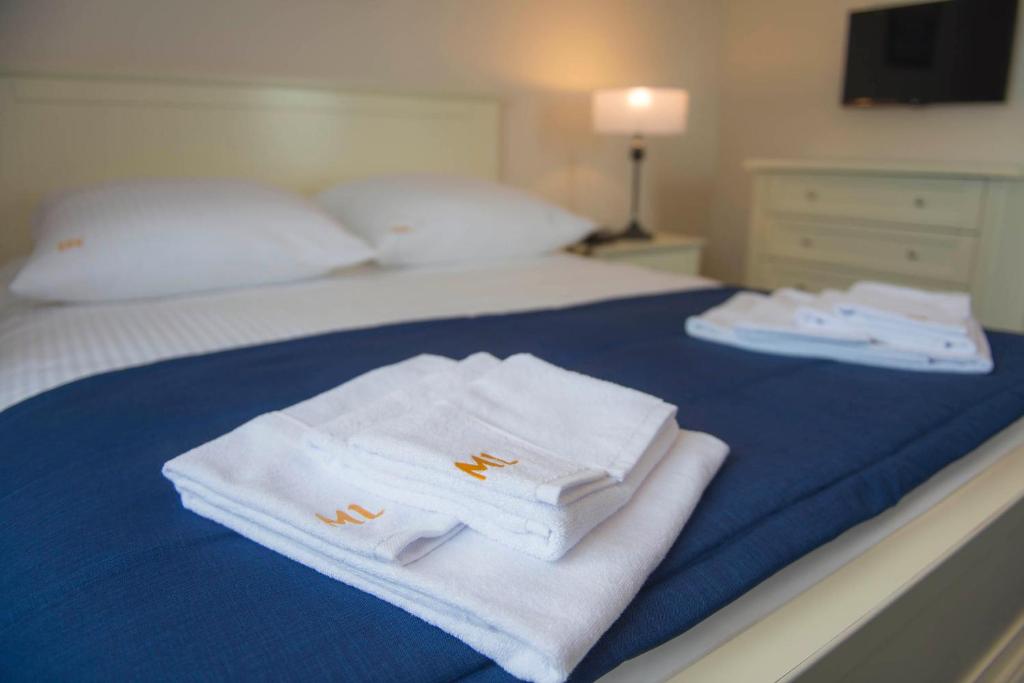 Posteľ alebo postele v izbe v ubytovaní Hotel Mona Lisa Wellness & Spa