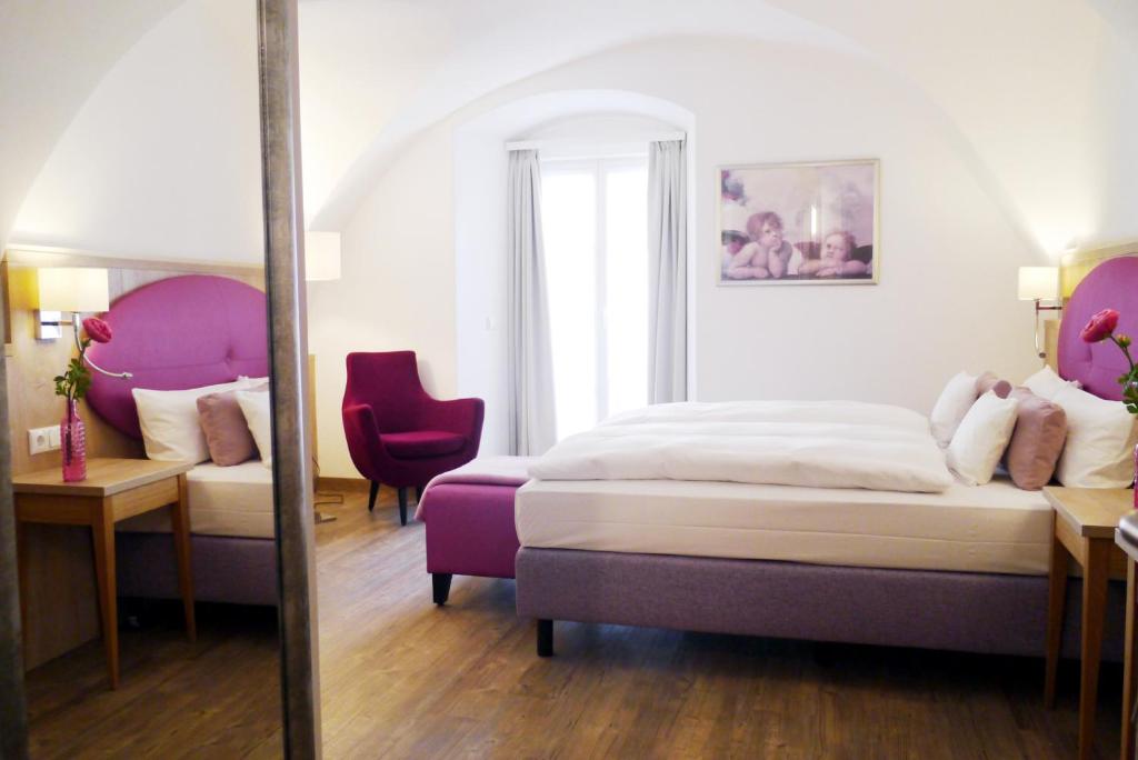 מיטה או מיטות בחדר ב-Das Brunners