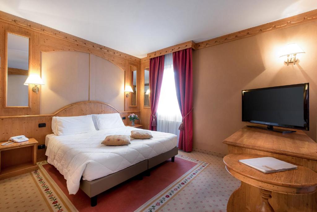 TV a/nebo společenská místnost v ubytování Hotel Rendez Vous