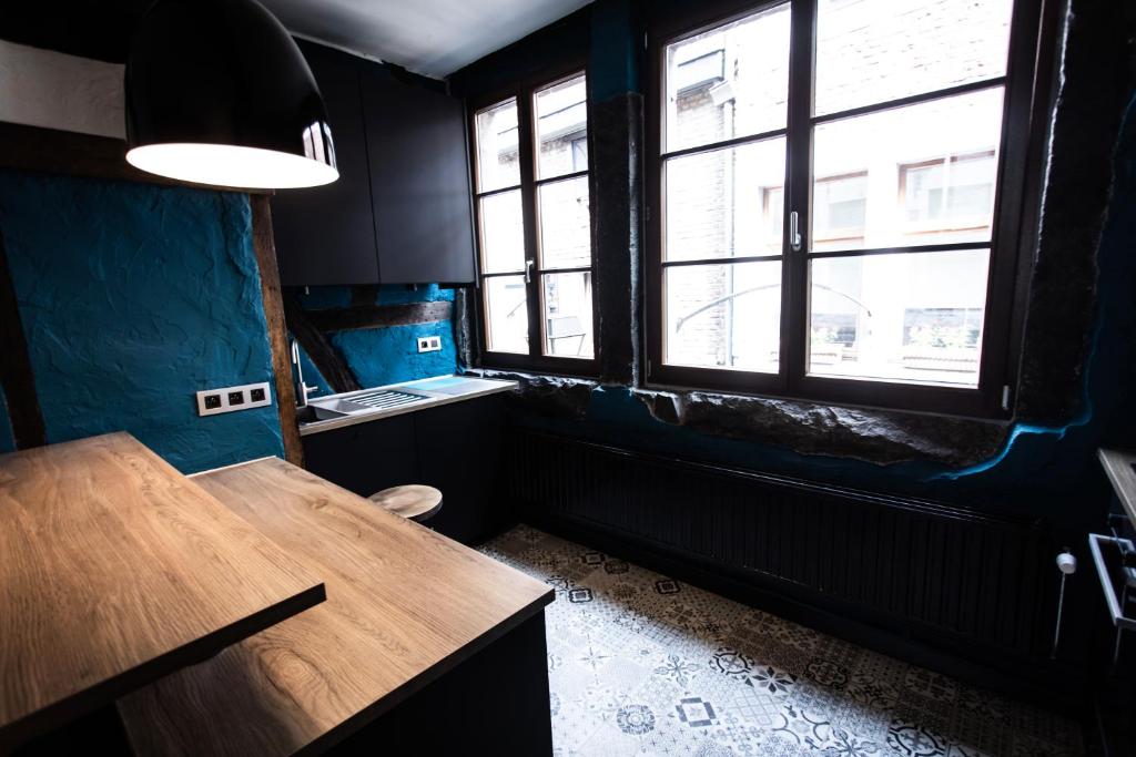 Posezení v ubytování Appartement atypique - coeur historique de Liège