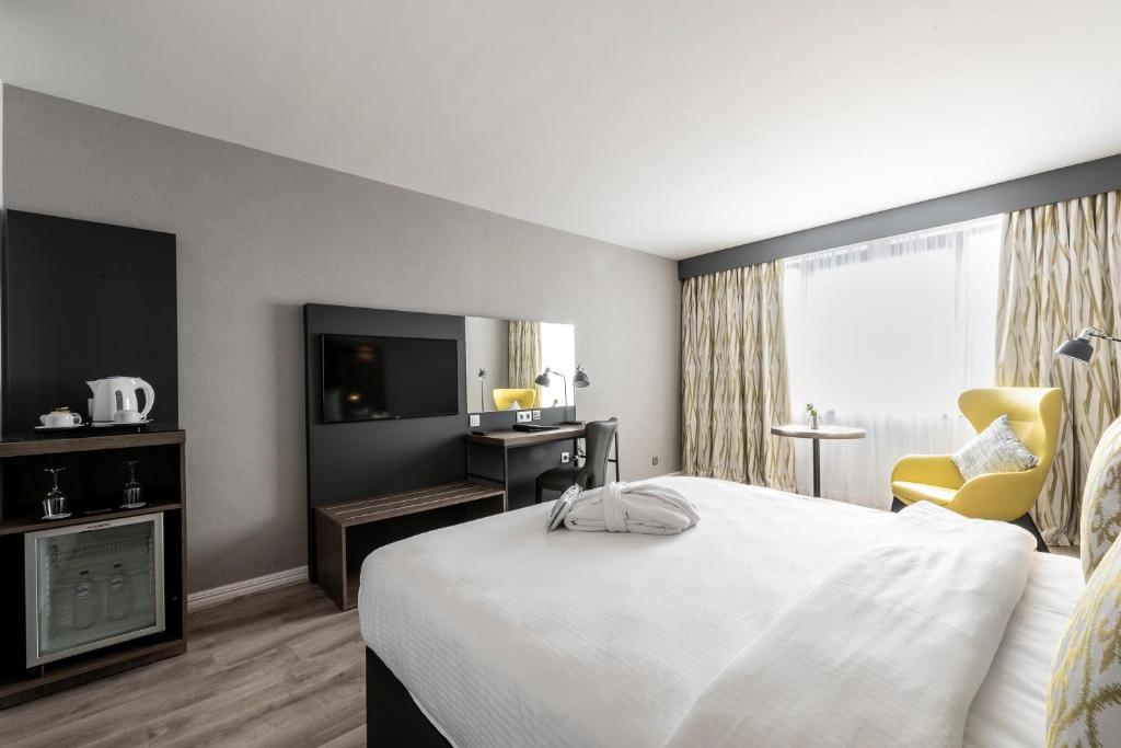 Postel nebo postele na pokoji v ubytování Gresham Belson Hotel Brussels