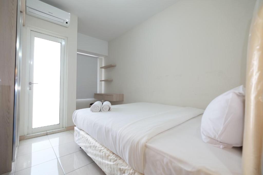 Minimalist Studio Room at The Springlake Apartment Sumarecon Bekasi By Travelio - Studiowohnung