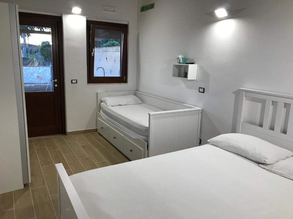 Postel nebo postele na pokoji v ubytování Playa Colorada