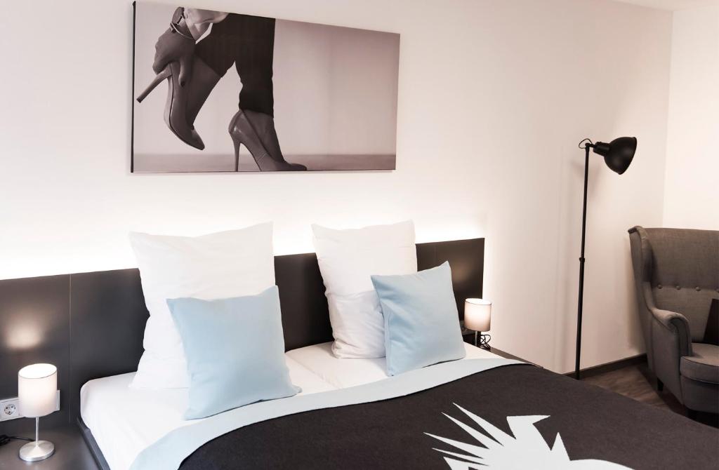 Postel nebo postele na pokoji v ubytování Mood contemporary living