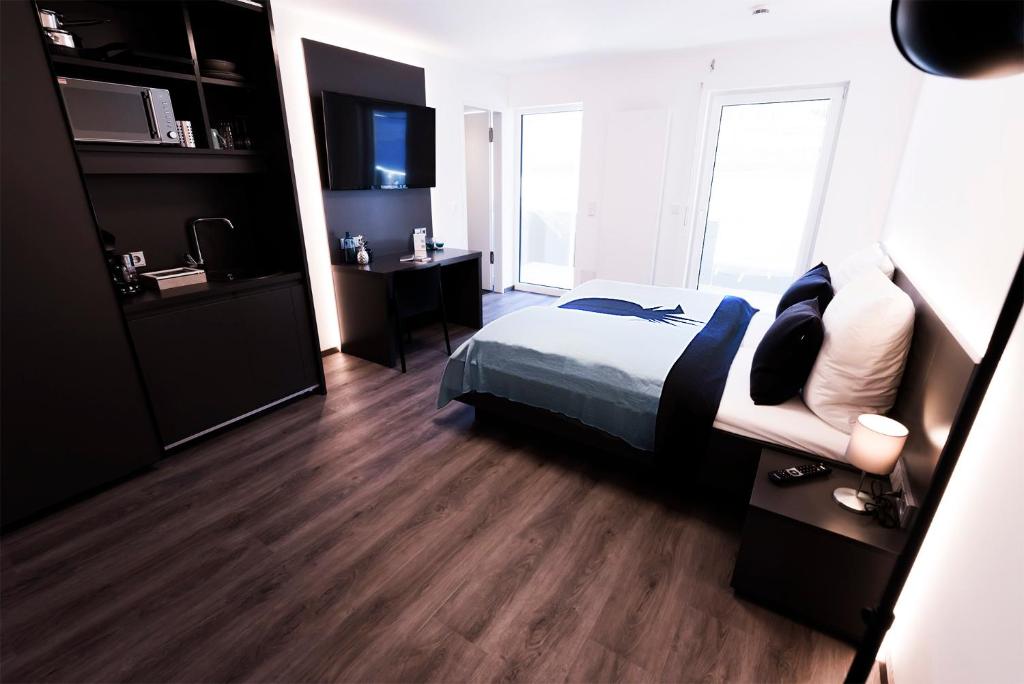 Postel nebo postele na pokoji v ubytování Mood contemporary living