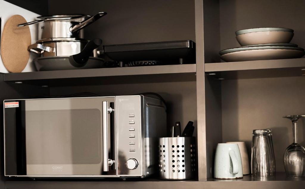 Kuchyň nebo kuchyňský kout v ubytování Mood contemporary living