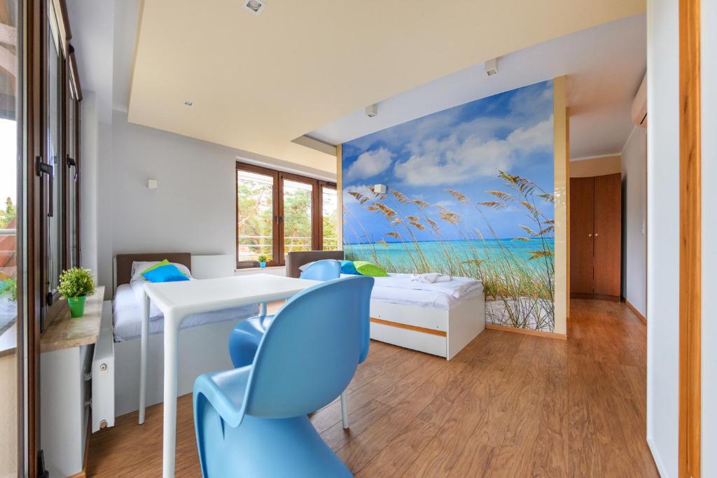Posteľ alebo postele v izbe v ubytovaní Apartamenty Sun & Snow Żeromskiego Krynica Morska - blisko morza