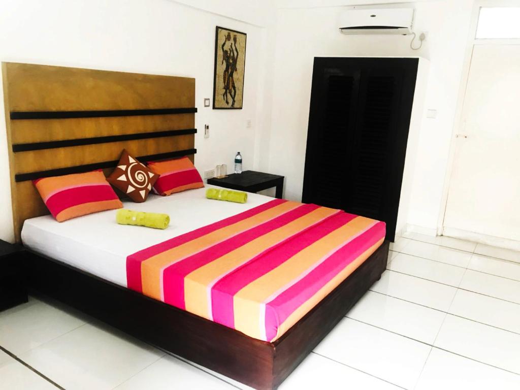 Postel nebo postele na pokoji v ubytování 360 Beach Residence