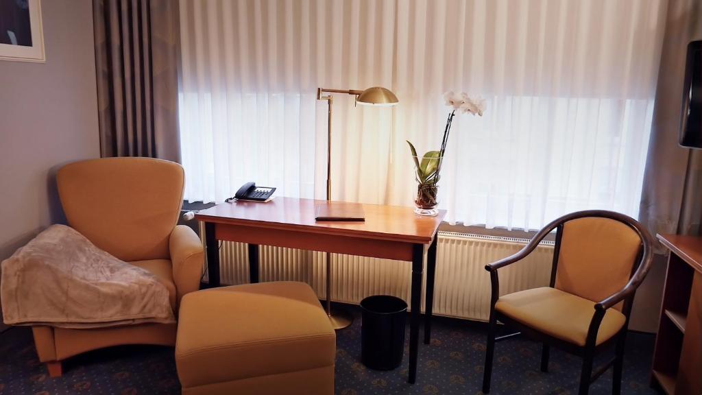 TV a/nebo společenská místnost v ubytování Hotel Jugendstil