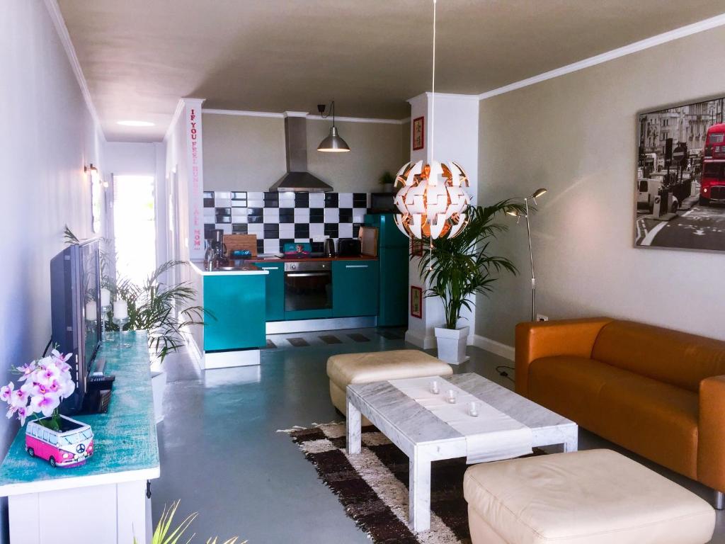 Posedenie v ubytovaní Casa Flamingo, Sea View Apartment