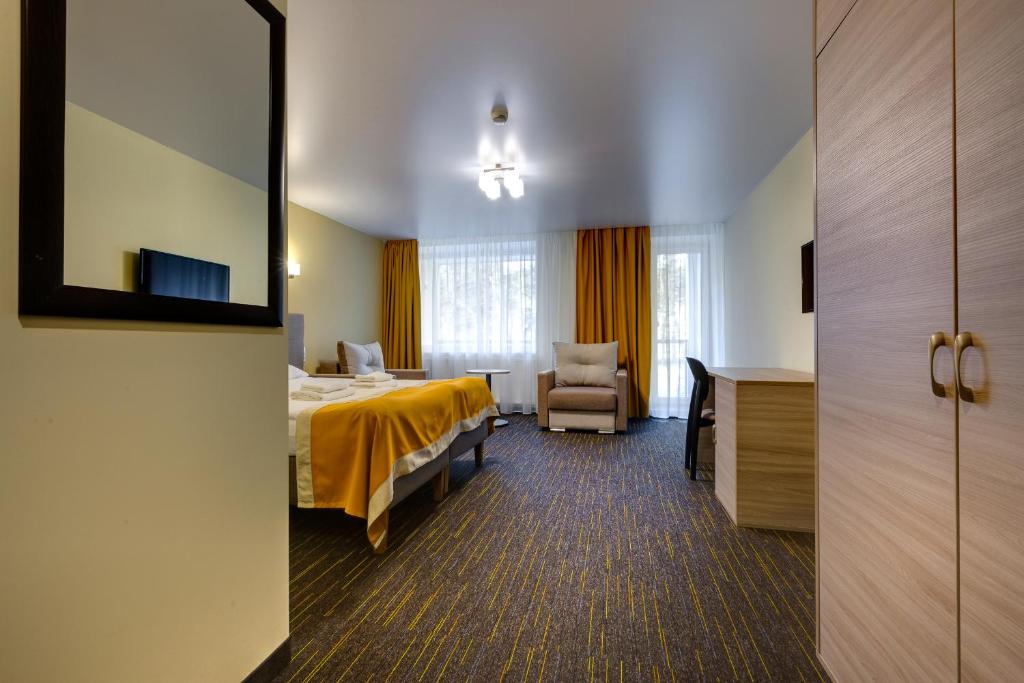 Postel nebo postele na pokoji v ubytování Liivarand Hotel