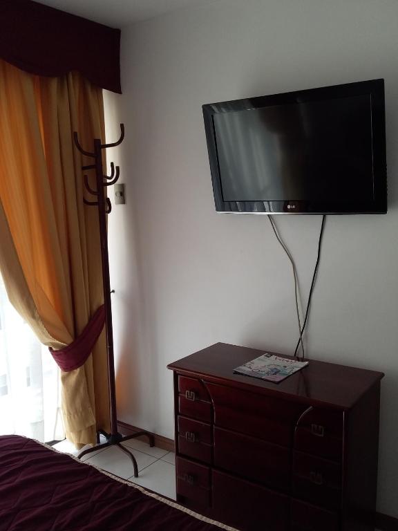 TV a/nebo společenská místnost v ubytování Apart Antofagasta