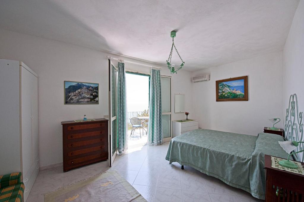 A bed or beds in a room at Villa Punta del Sole