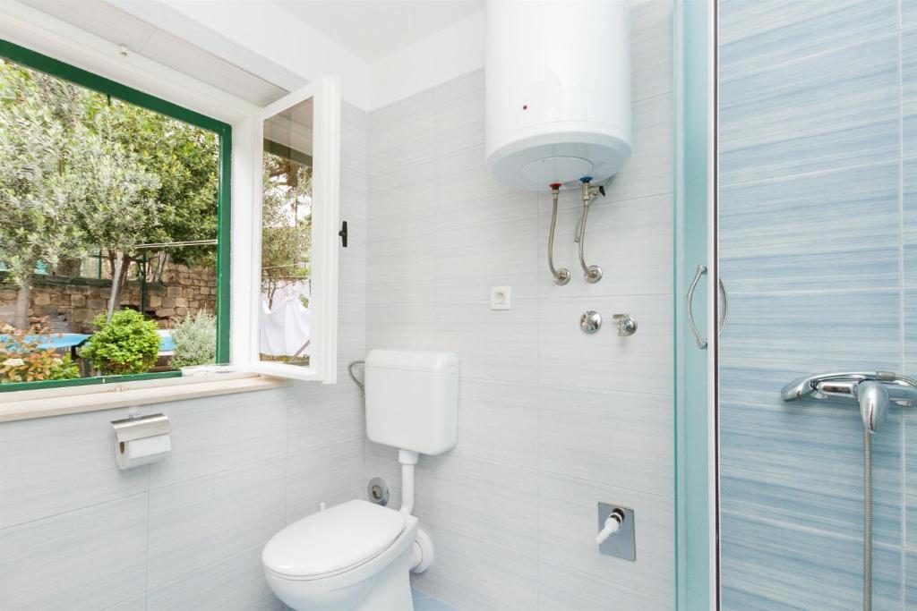 Kúpeľňa v ubytovaní Apartments Varos