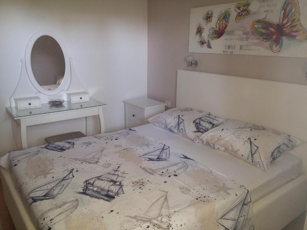 Posteľ alebo postele v izbe v ubytovaní Tone & Marta Apartments