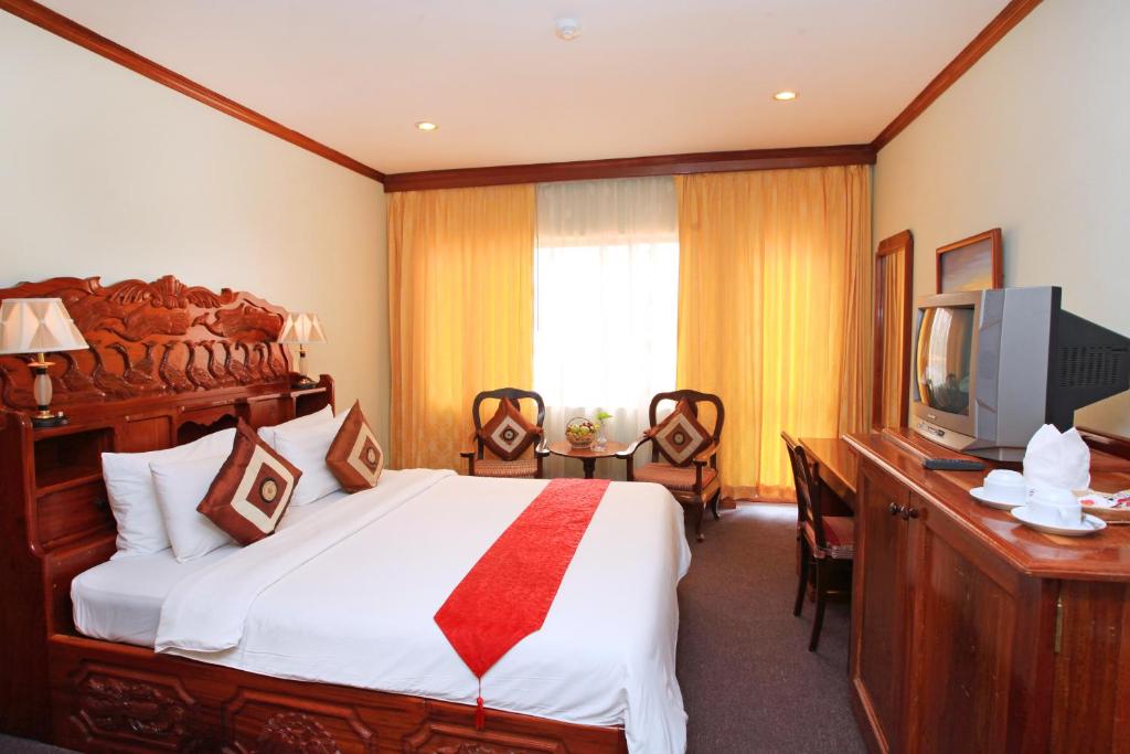TV a/nebo společenská místnost v ubytování Angkor Hotel