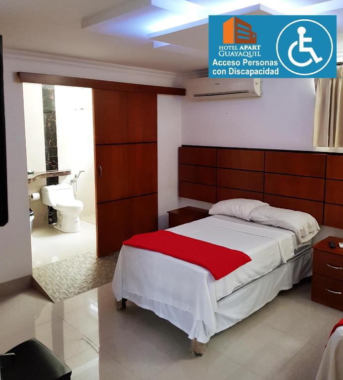 Postel nebo postele na pokoji v ubytování Hotel Apart Guayaquil Aeropuerto