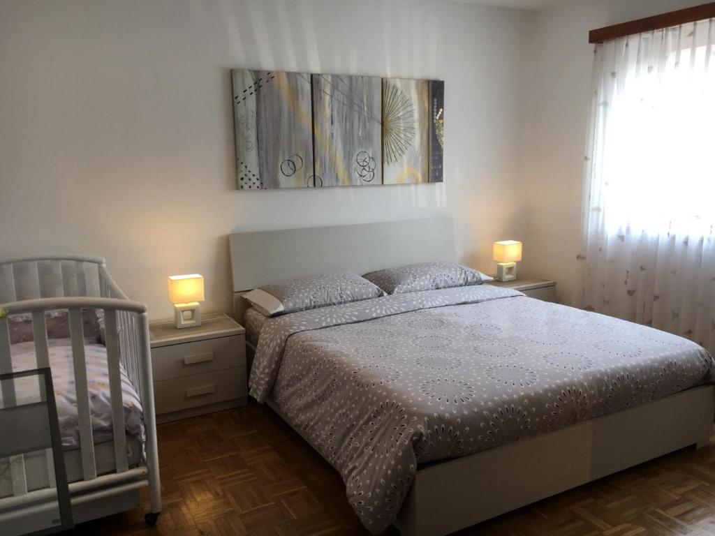 Postel nebo postele na pokoji v ubytování Casa Sheila