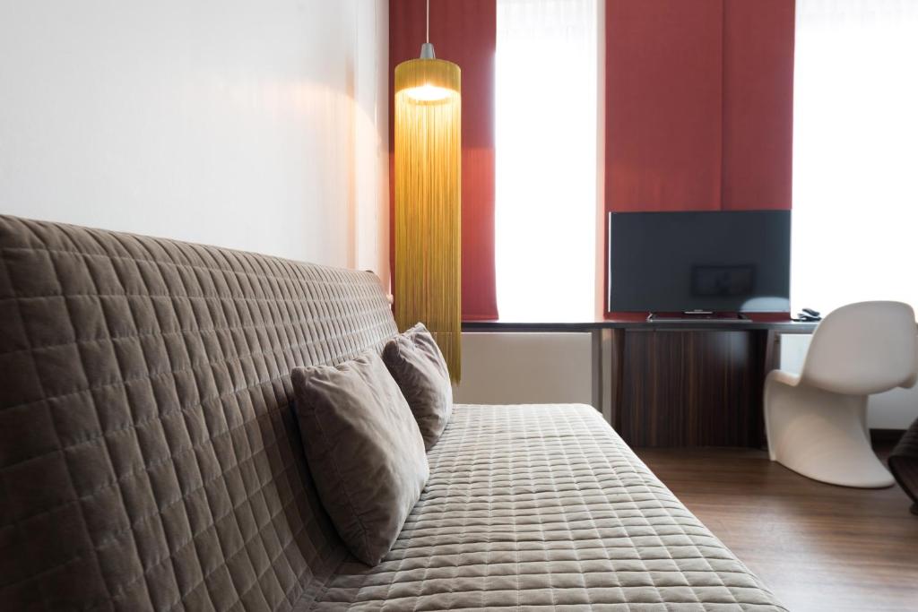 TV a/nebo společenská místnost v ubytování Hotel Casa Colonia