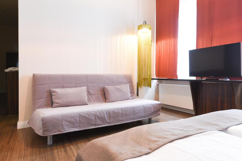 Postel nebo postele na pokoji v ubytování Hotel Casa Colonia