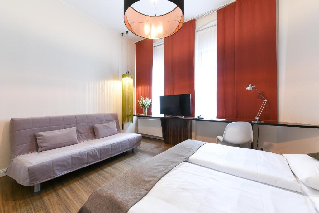 Postel nebo postele na pokoji v ubytování Hotel Casa Colonia