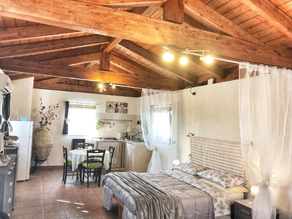 En eller flere senger på et rom på Trulli Caroli