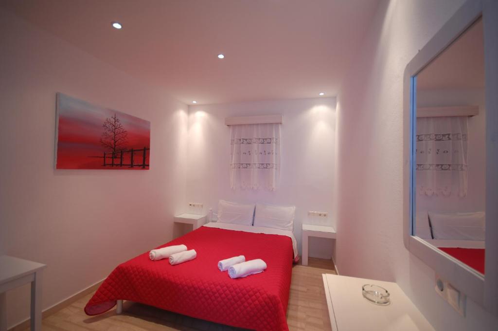 Postel nebo postele na pokoji v ubytování Hotel Milena