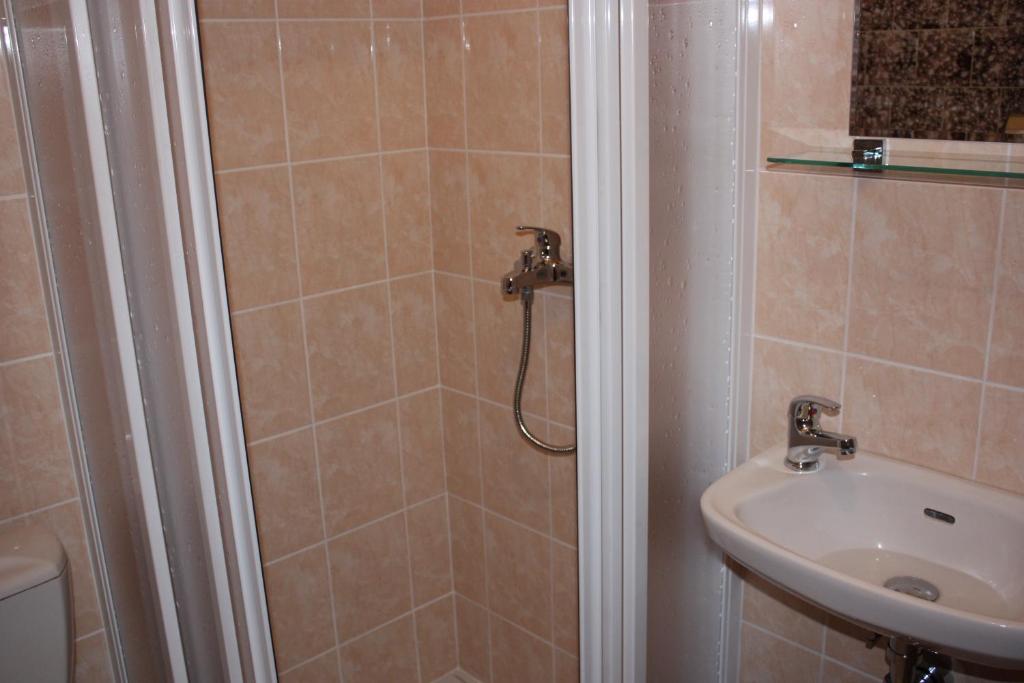 Koupelna v ubytování Hotel Hynek