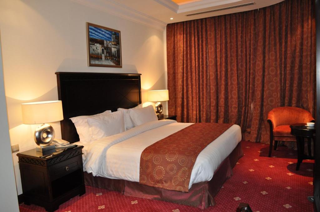 Postel nebo postele na pokoji v ubytování Musherib Hotel