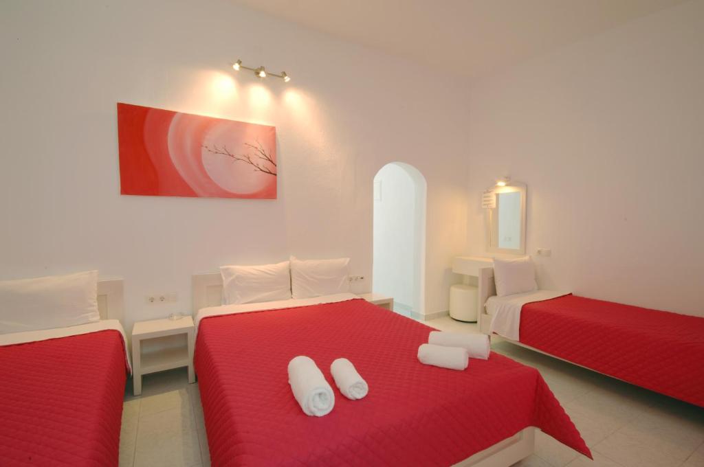 Postel nebo postele na pokoji v ubytování Hotel Milena
