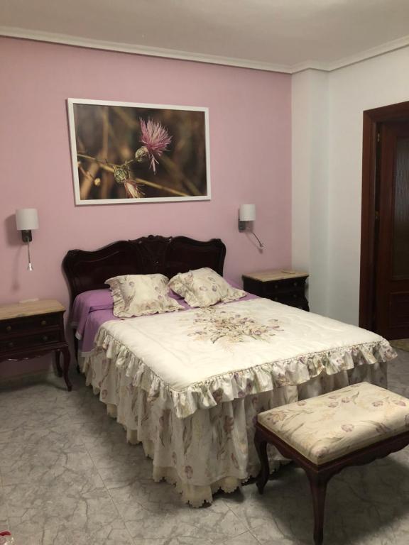 A bed or beds in a room at Peso de la Harina - piso completo