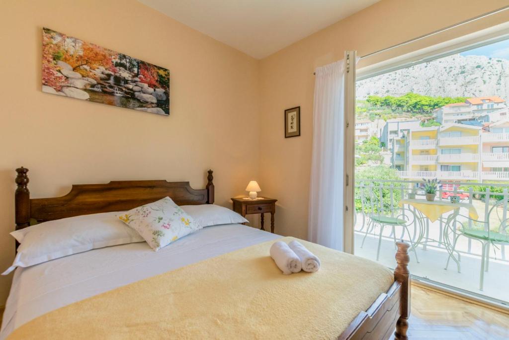 Posteľ alebo postele v izbe v ubytovaní Apartments and Room Alen