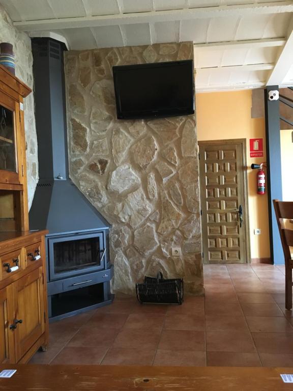 TV a/nebo společenská místnost v ubytování ALTO DE LA RESERVA