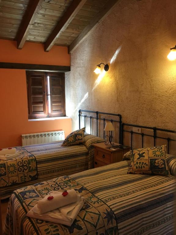 Postel nebo postele na pokoji v ubytování ALTO DE LA RESERVA