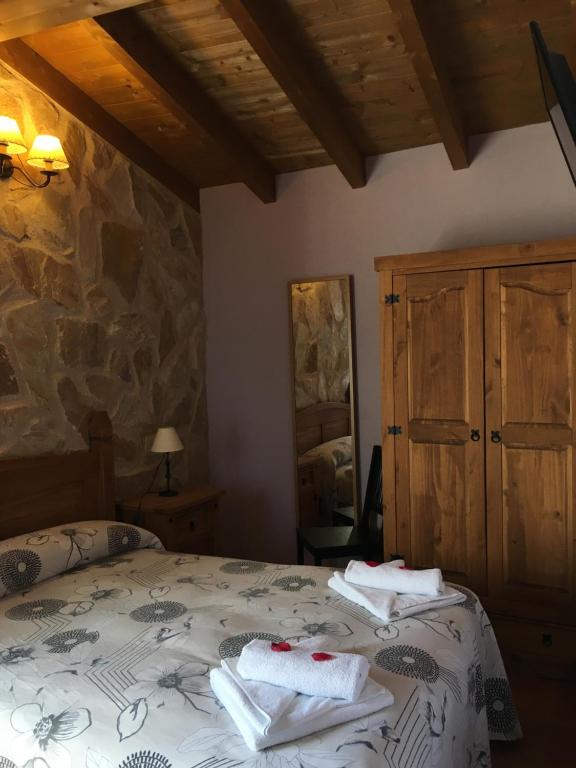 Postel nebo postele na pokoji v ubytování ALTO DE LA RESERVA