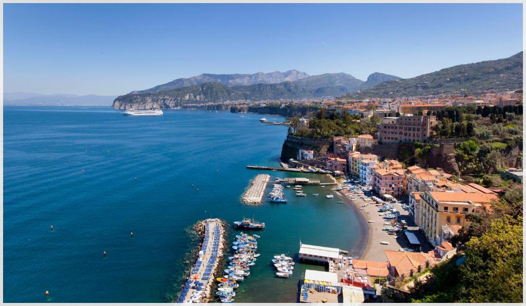 an aerial view of a harbor with boats in the water at Hotel Settimo Cielo in Sorrento