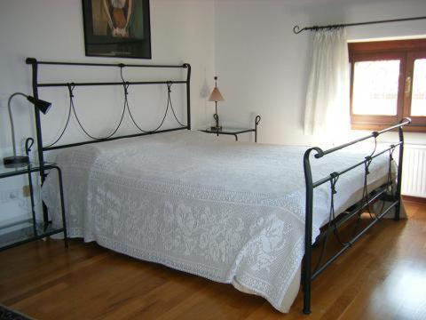 Postel nebo postele na pokoji v ubytování Agriturismo Grillo Iole Winery