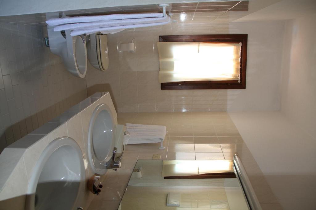 Koupelna v ubytování Hotel 3 Botti