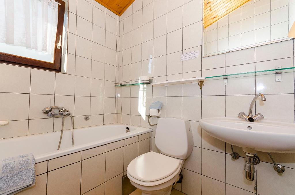 Kúpeľňa v ubytovaní Apartments Rozalija
