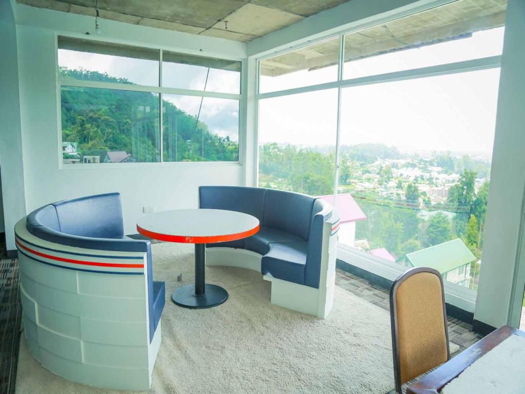 Posezení v ubytování Namadi Nest home stay