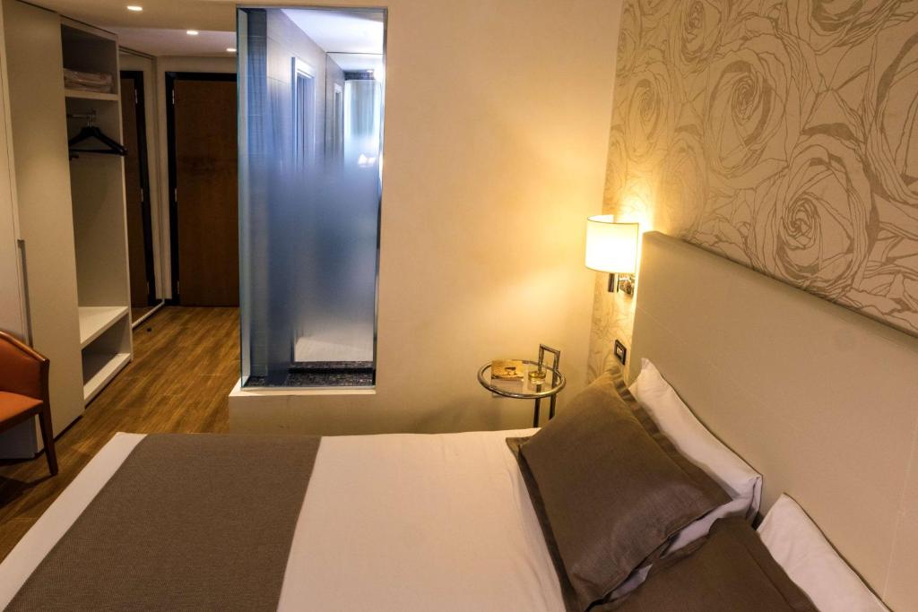 Postel nebo postele na pokoji v ubytování Best Western Hotel City