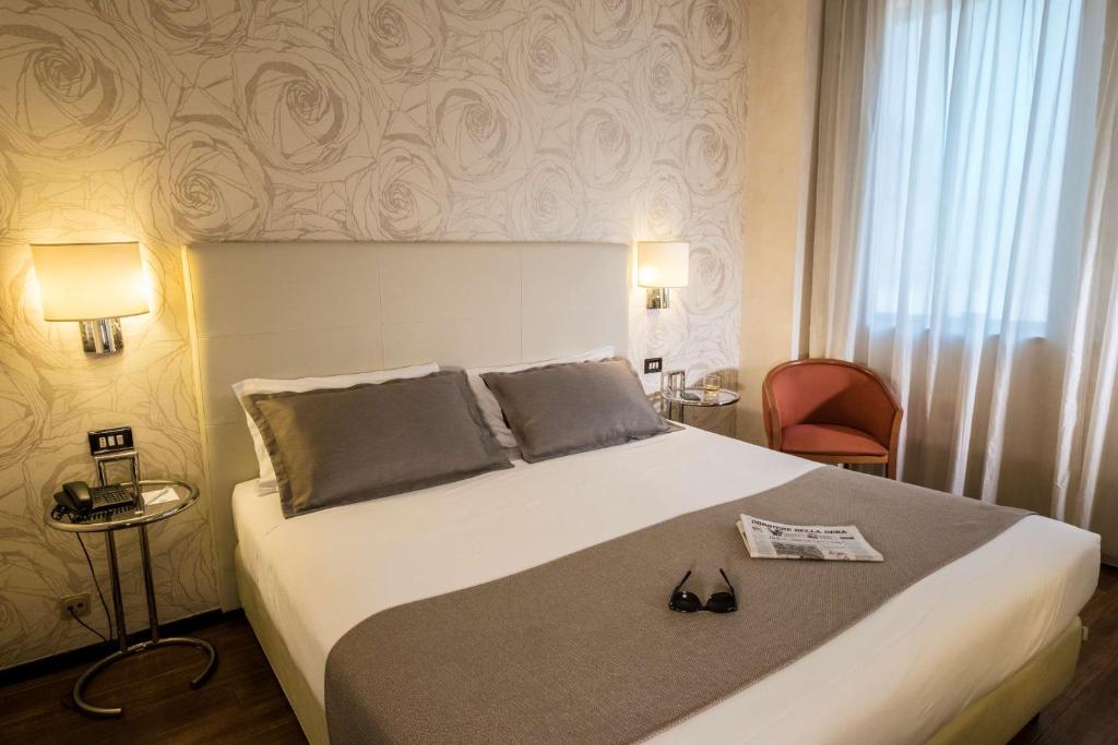 Postel nebo postele na pokoji v ubytování Best Western Hotel City