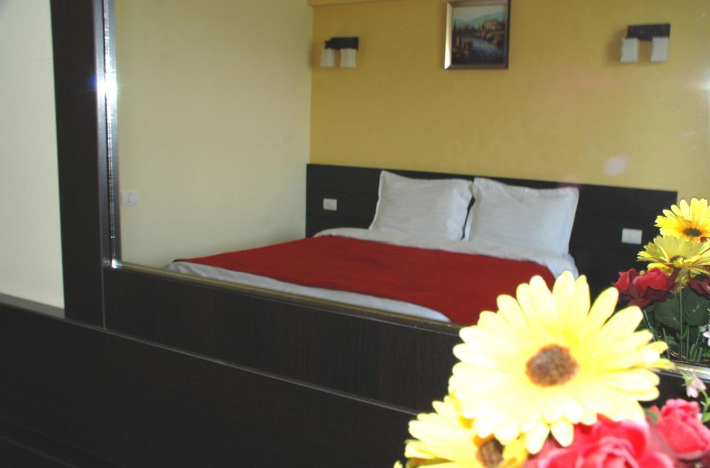 Postel nebo postele na pokoji v ubytování Hotel Ancor