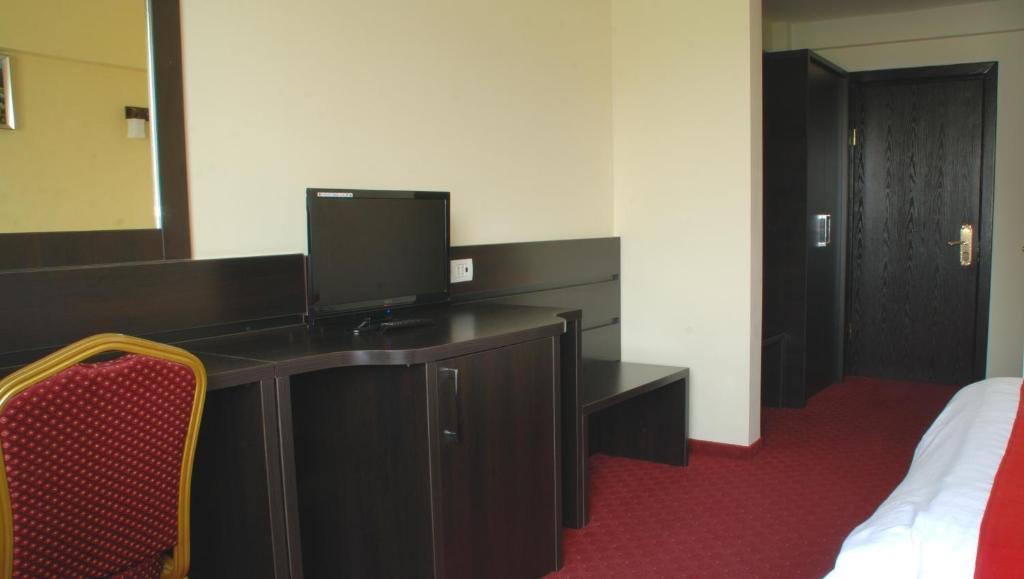 Postel nebo postele na pokoji v ubytování Hotel Ancor