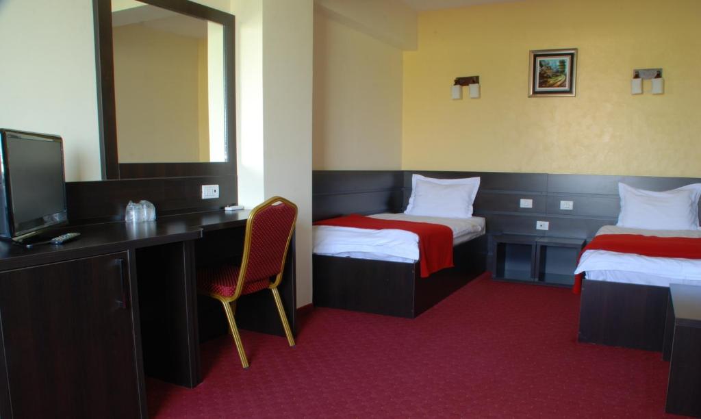 Postel nebo postele na pokoji v ubytování Hotel Ancor