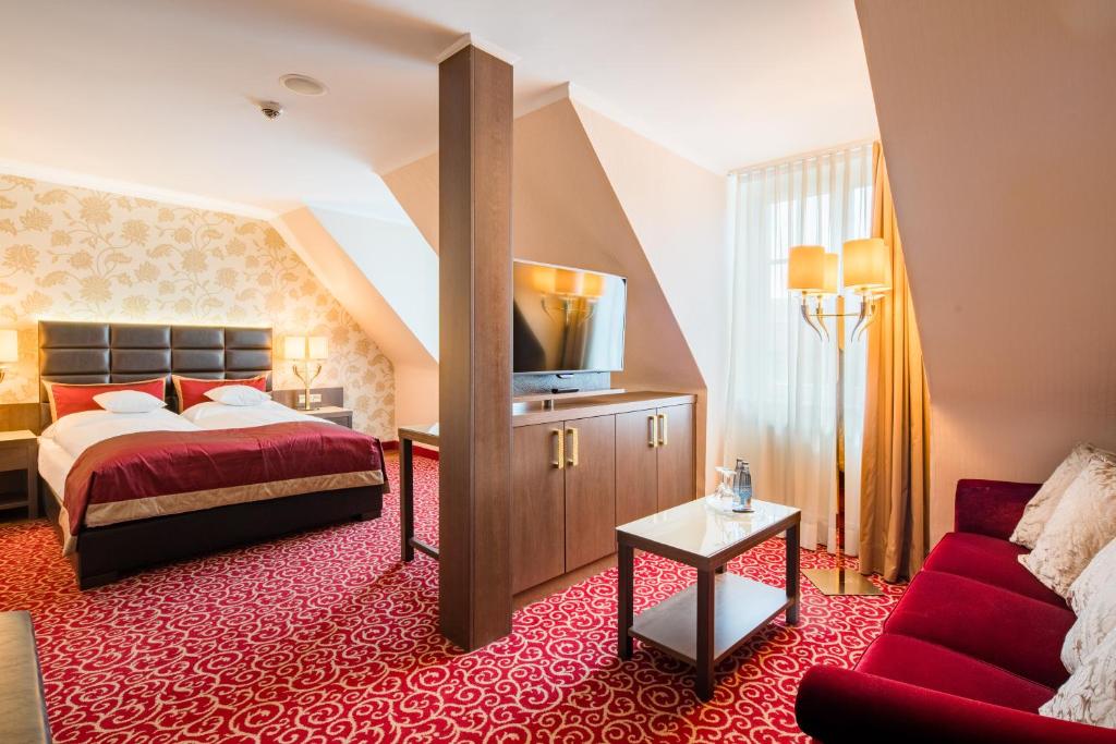 Postel nebo postele na pokoji v ubytování Best Western Plus Hotel StadtPalais